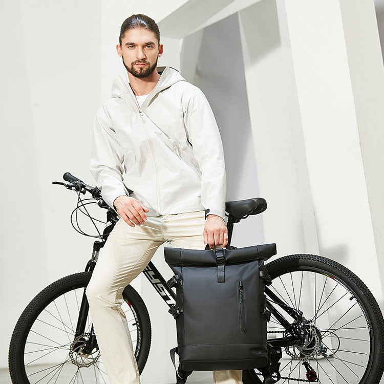 Modeled look of the 20L-27L roll-top everyday backpack for commuting