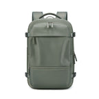 Front view of RolePack 20L Expandable Travel Backpack in dark grreen