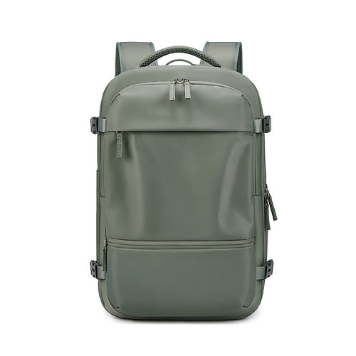 Front view of RolePack 20L Expandable Travel Backpack in dark grreen
