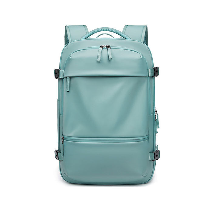 Front view of RolePack 20L Expandable Travel Backpack in mint green