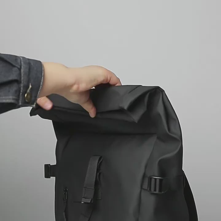 A comprehensive showcase video of the 20L Roll-Top Backpack. Features include close-ups of the weatherproof 900D coated fabric and YKK zippers, a detailed breakdown of the internal pocket layout and the 16-inch side-access laptop compartment, and a lifestyle demonstration showing the ergonomic back panel and shoulder straps worn during daily commuting.