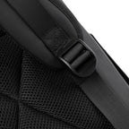 A close-up of the shoulder strap adjustment strap on a waterproof travel backpack.