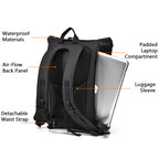 Side view of the roll-top backpack showing the dedicated quick-access padded compartment for a 16-inch laptop.