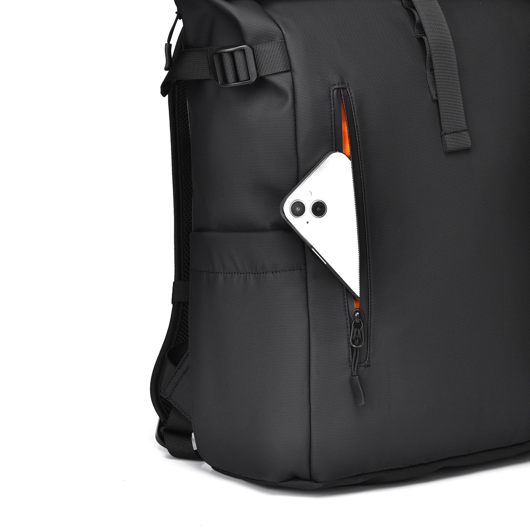 Close-up of the heavy-duty YKK weatherproof vertical zipper on the front pocket of the black backpack.