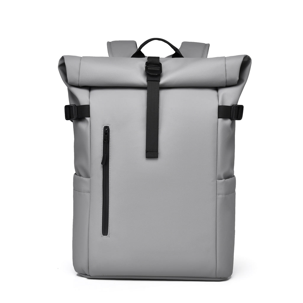 A minimalist slate grey 20L waterproof roll-top backpack for daily transit and travel.