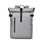 A minimalist slate grey 20L waterproof roll-top backpack for daily transit and travel.